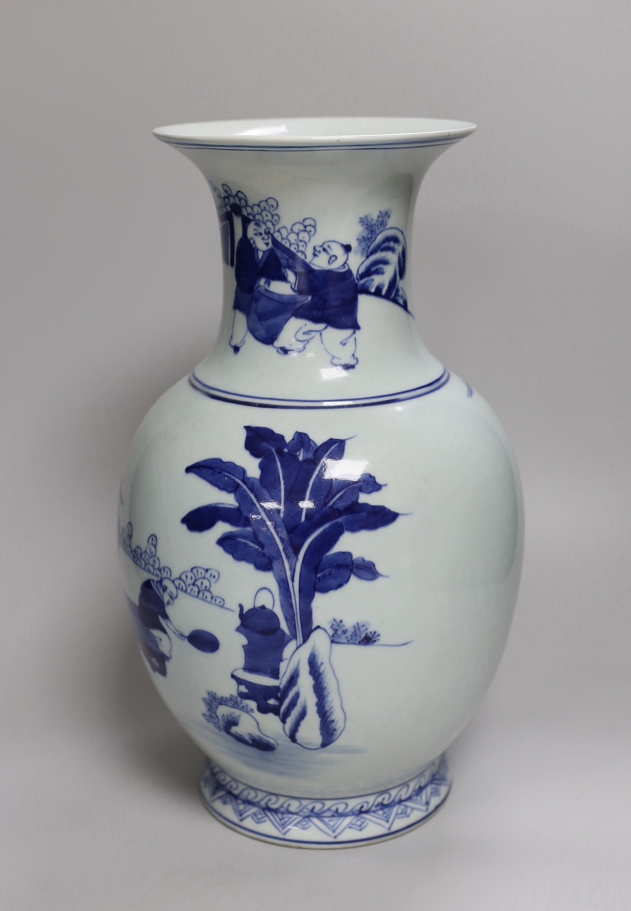 A Chinese blue and white 'scholar's' vase, early 20th century. 37cm high